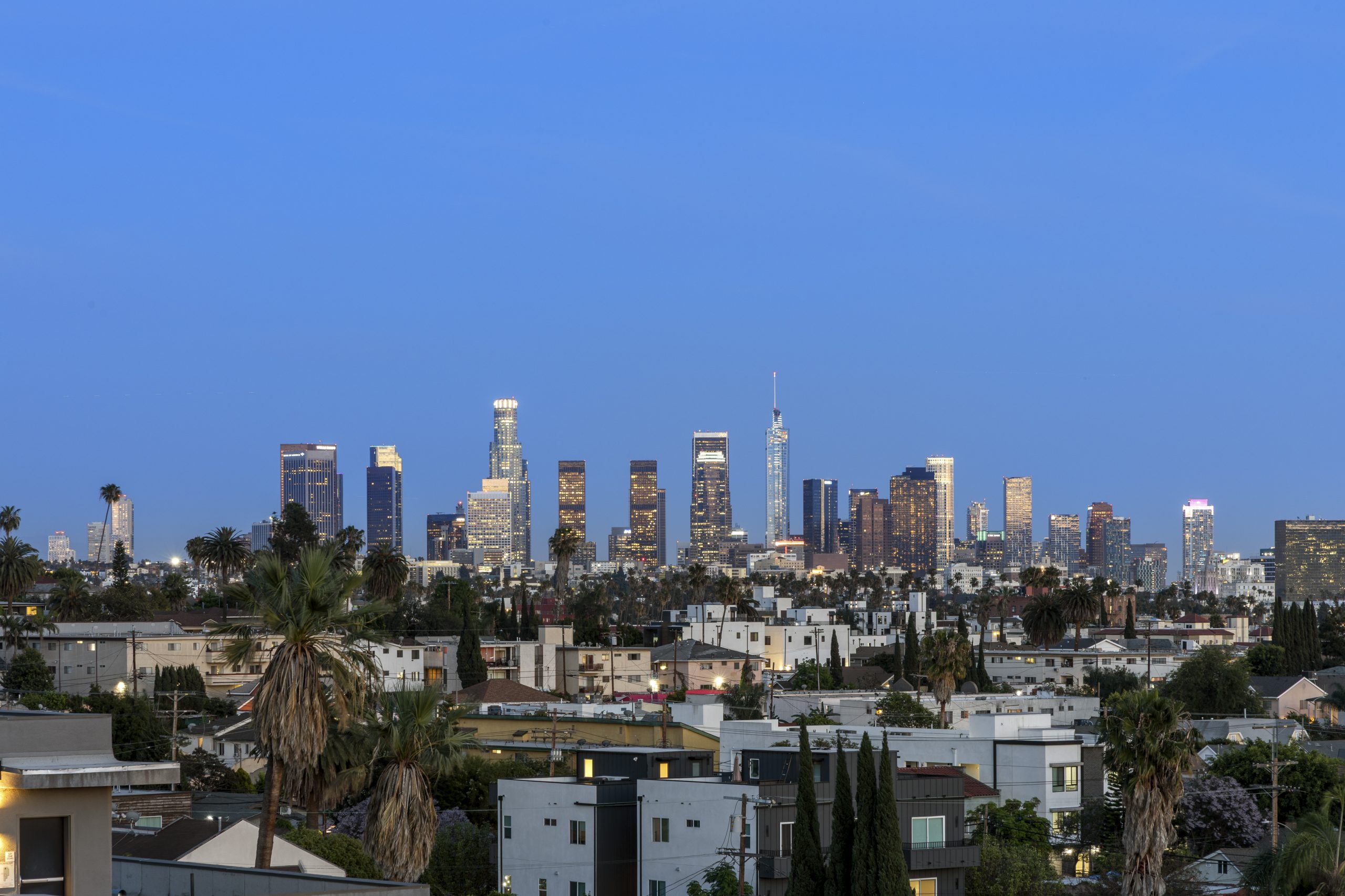 Panoramic downtown skyline view from urban residential neighborhood.
