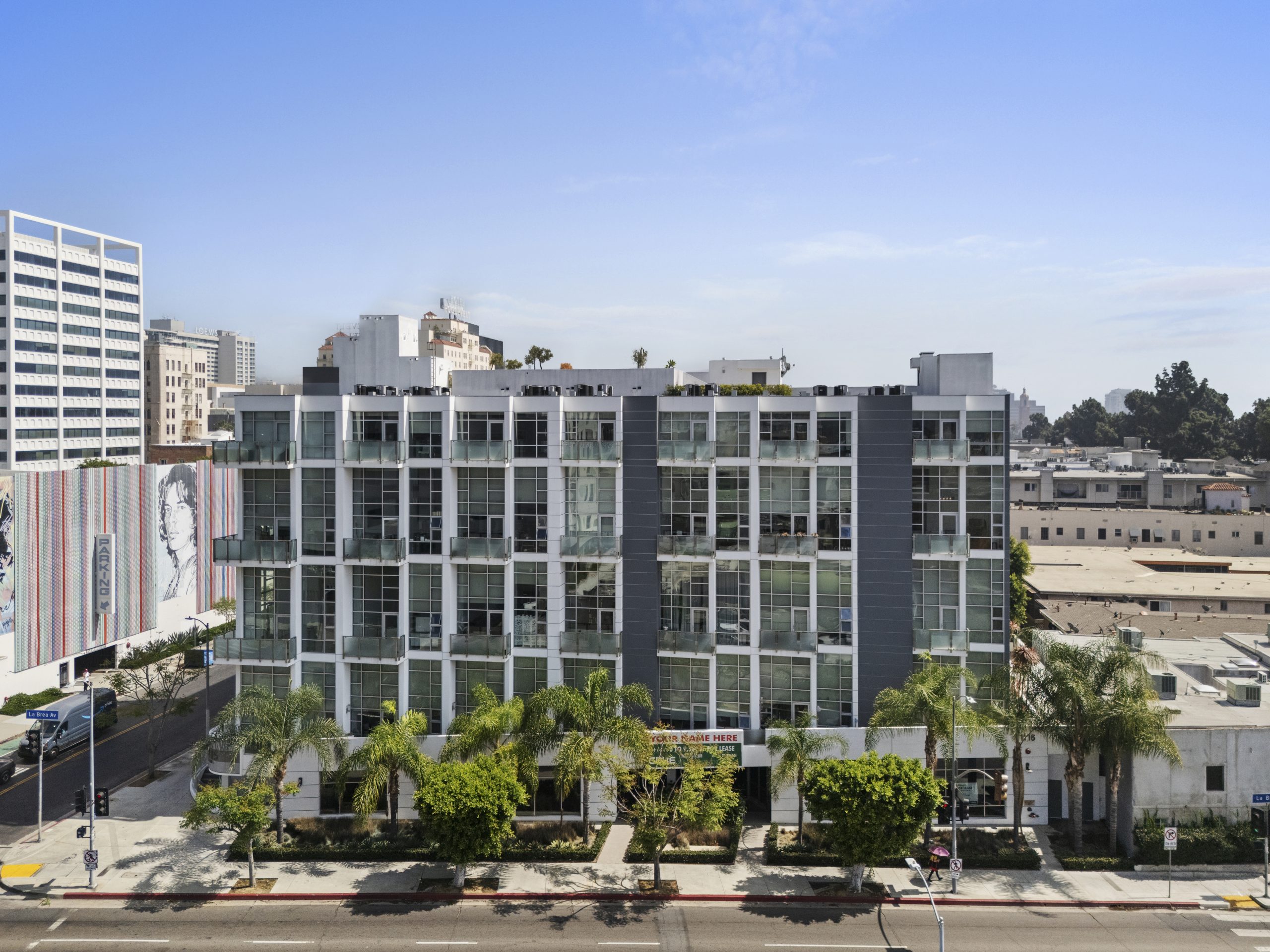 Contemporary mixed-use commercial building in urban downtown district.