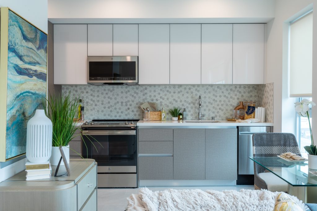 Contemporary apartment kitchen with sleek cabinetry and modern interior finishes.