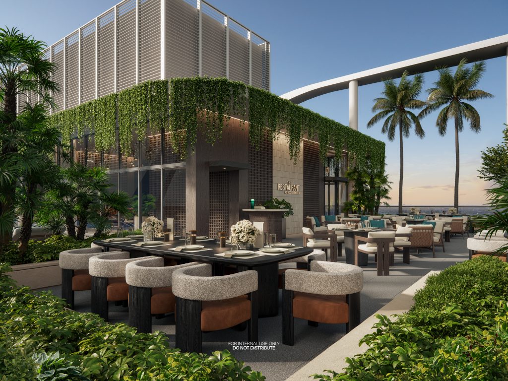 Luxury outdoor dining and lounge area with modern landscaping and palm trees.